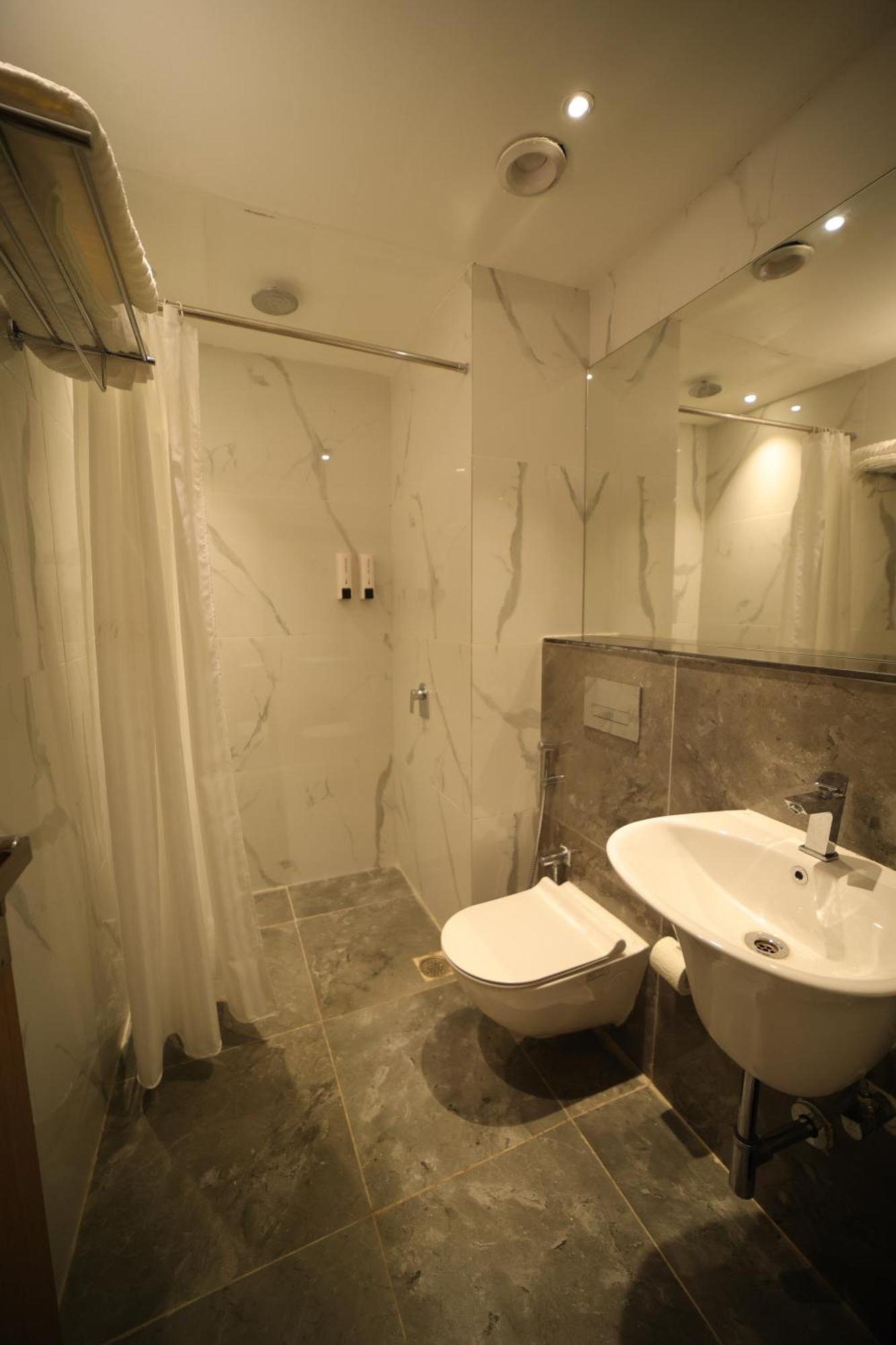 Hotel Marigold Бхубанешвар Номер фото